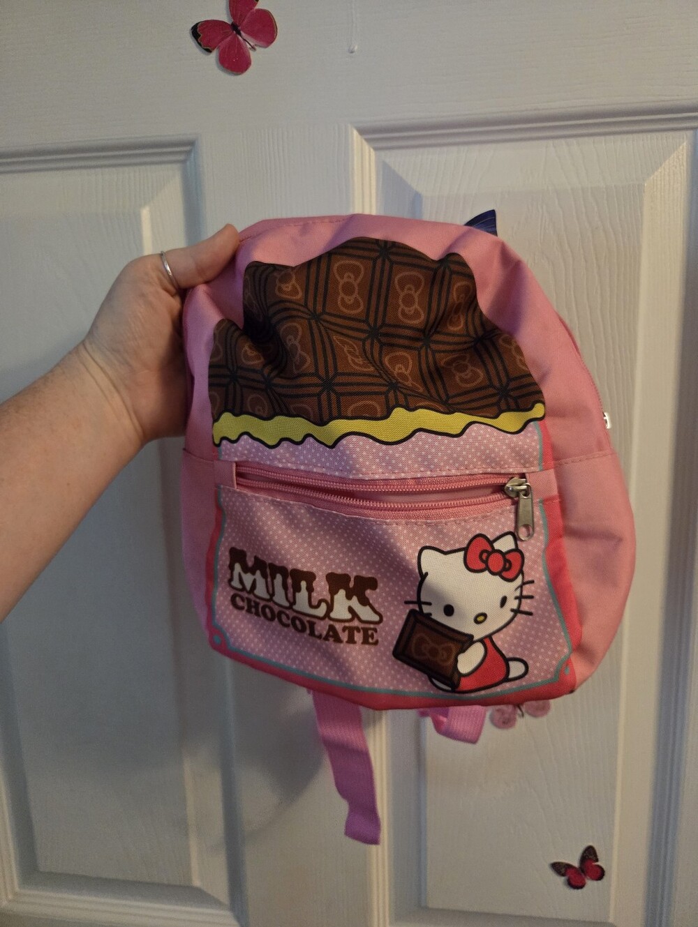 Cute pink small hello kitty backpack milk chocolate **needs repair see pics